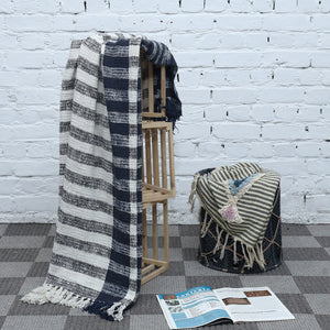 Striped blue throw with fringes Striped blue throw with fringes