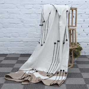 Woven beige string throw Woven beige string throw