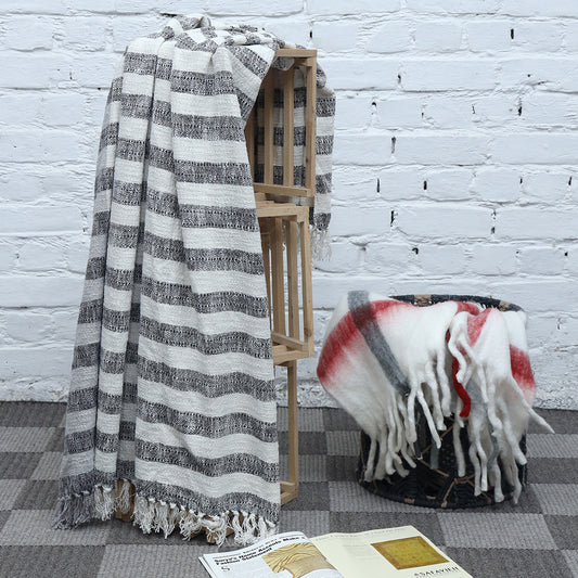 Striped blue throw with fringes